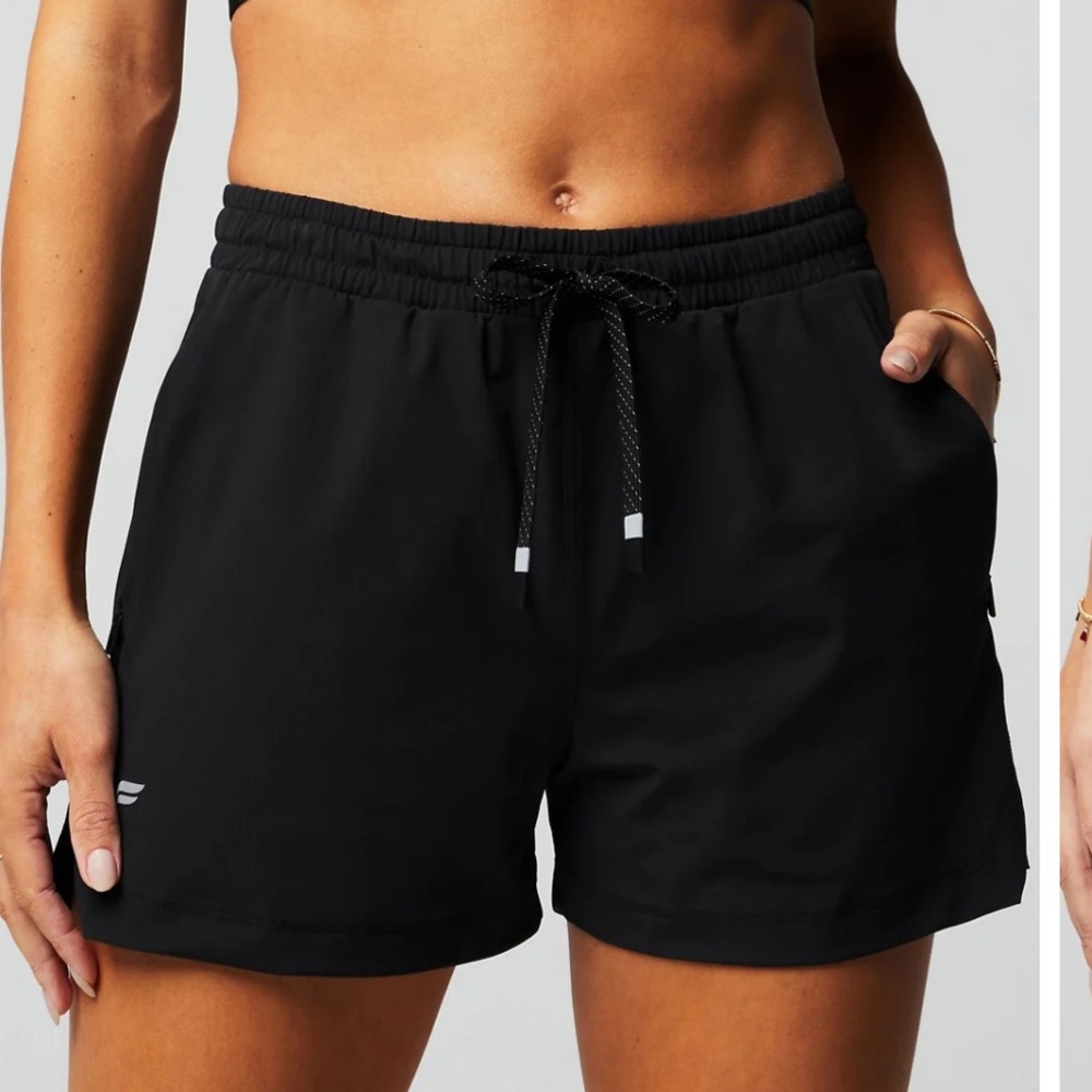 Fabletic Shorts, size small. Side zip-up pockets.